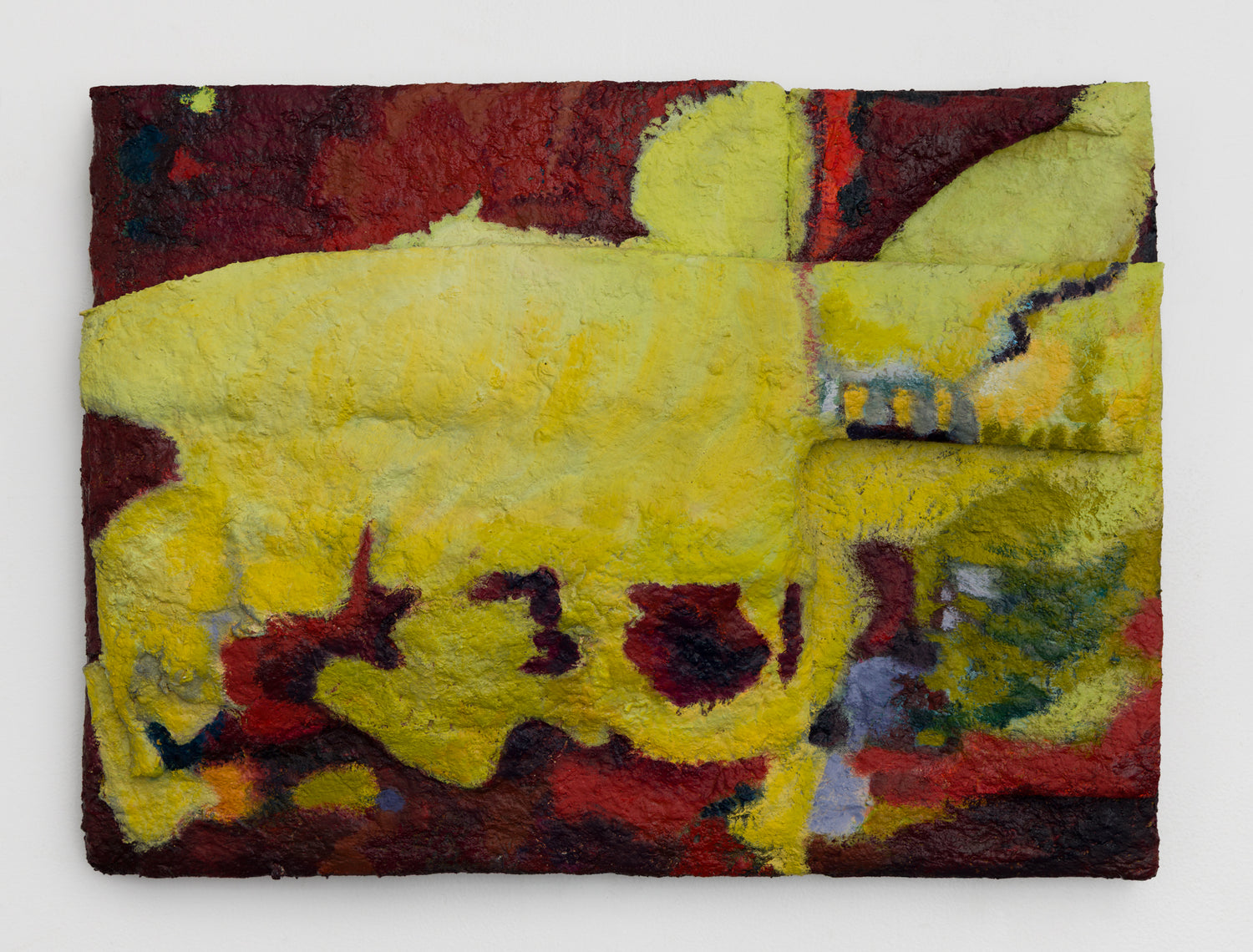 Abstract textured painting with a yellow design on a red and brown background